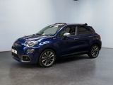 a blue fiat suv parked in a showroom