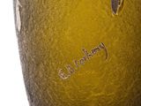 a yellow vase with the word blackberry written on it