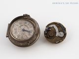 a silver pocket watch and a silver pocket watch on a white surface