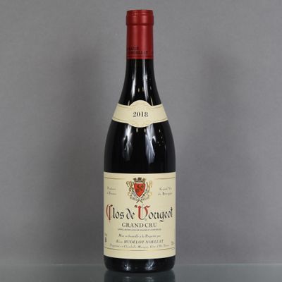 a bottle of wine that is sitting on a table