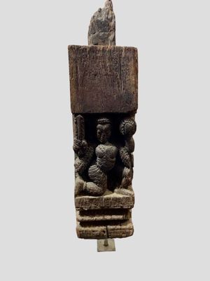 an image of a statue of a man and woman sitting on a bench