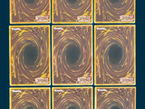 six square tiles with a yellow swirl on them on a blue background