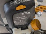 a close up of a motorcycle with a chain attached to it
