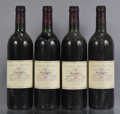 three bottles of wine are lined up on a table