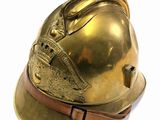 a gold helmet on a white background with a brown belt