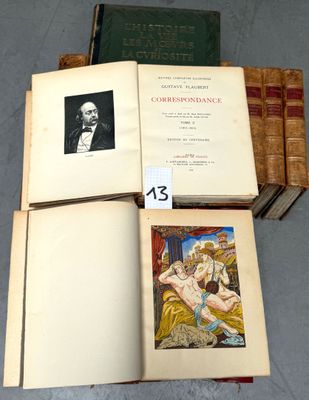 several books are stacked on top of each other on a table