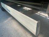 a boat that is sitting in the back of a truck