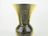 a black and yellow vase with a cat design on it