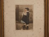 framed picture of a little girl in a blue dress and hat
