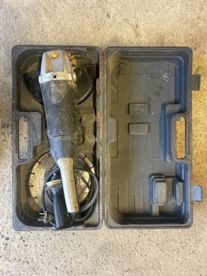 a tool in the case that is sitting on the floor