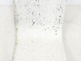 an image of a white chair sitting on top of a white floor