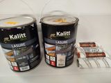 two cans of paint sitting on a shelf next to each other