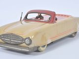 a toy car that is sitting on a white surface