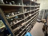 a room with a lot of shelves filled with various items