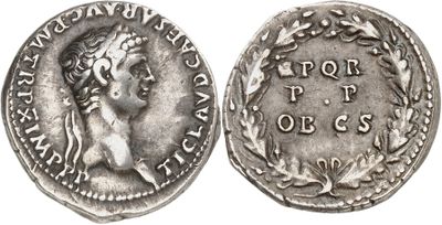 a silver coin with an image of a woman on it