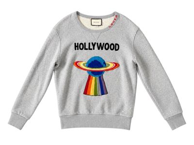 a grey sweatshirt with an image of a spaceship on it