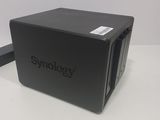 an image of a black box with the word synology written on it