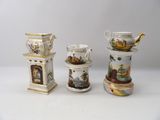 three different types of porcelain vases are displayed on a white surface