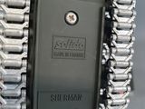 a close up view of a machine that has a chain attached to it