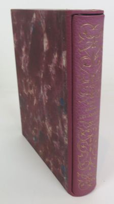 the book is purple with gold writing on the cover
