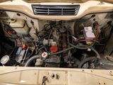 a car engine with a lot of wires in it