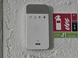 an image of a fire extinguisor sign on a wall