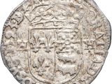 an old silver coin with a coat of arms on it