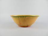yellow and green bowl on white background with white background