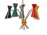 a multi colored chandelier hanging from the ceiling