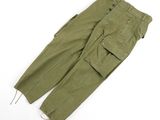 a pair of olive green cargo pants on a white background