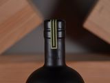 a bottle of wine that is sitting on a table