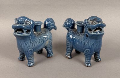 pair of blue ceramic foo foo dogs with open mouth and open mouth