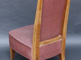 an image of a wooden chair with pink upholstered upholstered seat