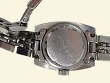 a close up of a watch on a bracelet