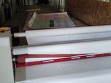 an image of a machine that is working on a piece of paper