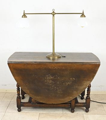 an image of a table with a lamp on top of it