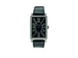 une image représentant une montre noire dont le cadran est orné de diamants