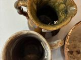 three cups sitting next to each other on a table