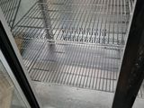 an image of an open refrigerator with a lot of food inside of it