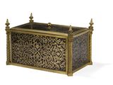 a gold and black box sitting on a white surface