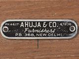 an image of a close up of a wooden drawer with a label on it