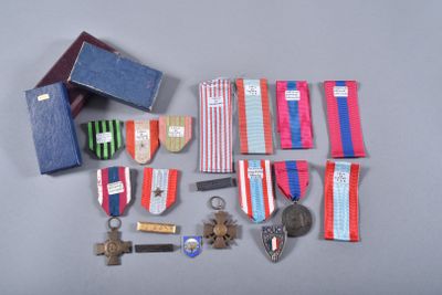 many medals and other items that are on the table