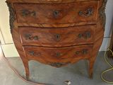 two lamps that are on top of a chest of drawers