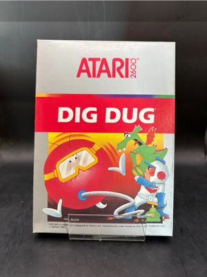 a box of atari ' s dig dug game on a table