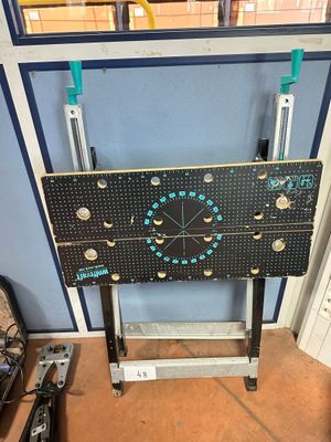 a table that has a clock on it in a room