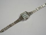 an image of a wrist watch on a white surface with a white background