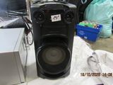 a speaker that is sitting on top of a table