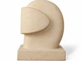 the sculpture is made out of stone and has a curved shape