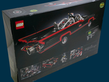 lego batman batmobile set in a box on a blue background