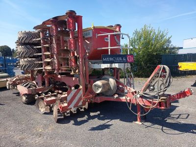a tractor that is parked in the parking lot